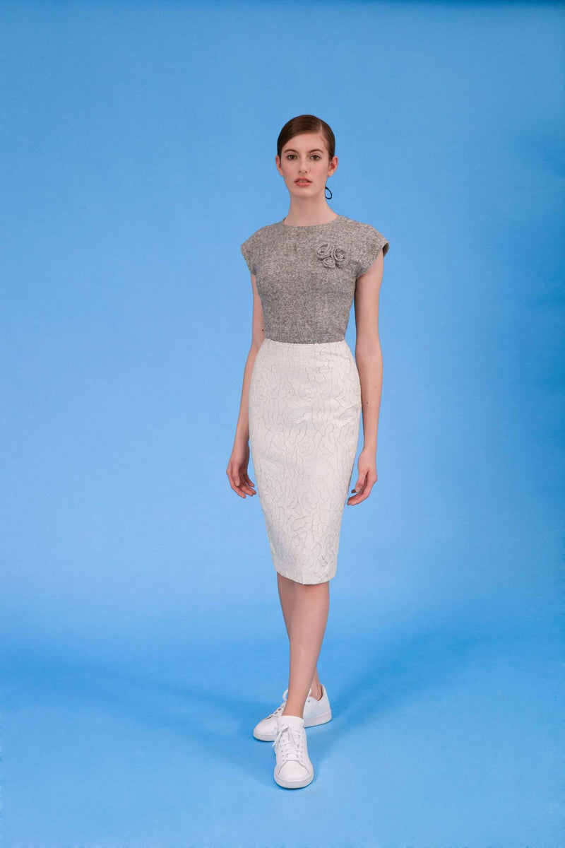 Laser cut faux leather pencil skirt in icy ivory front view