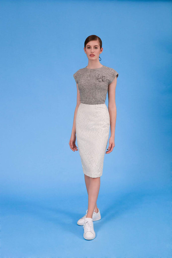 Laser cut faux leather pencil skirt in icy ivory front view